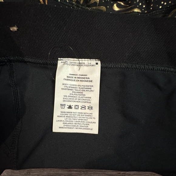 NWOT - Nike Women's Athletic Shorts in Black and Gold - Picture 5 of 5